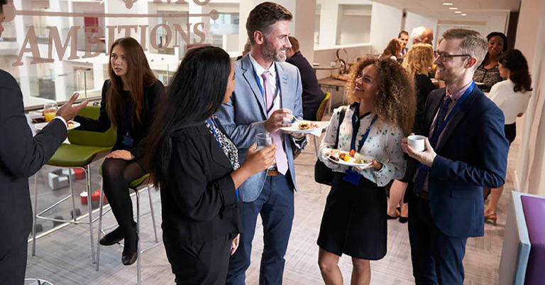 Hospitality Suites: The Hidden Side of Trade Shows 4 Professionals networking in a hospitality suite