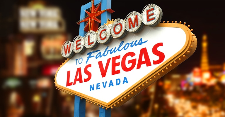 Top Trade Show Cities in the US: The Ultimate List 3 Iconic "Welcome to Fabulous Las Vegas, Nevada" sign illuminated at night with vibrant city lights in the background.