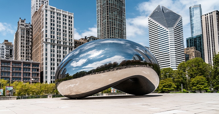 Top Trade Show Cities in the US: The Ultimate List 5 The Cloud Gate sculpture, known as "The Bean," in Millennium Park, Chicago, with city skyscrapers in the background.